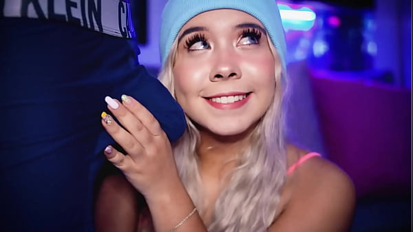 Image Blonde college student with a cute face stimulates her boyfriend's cock over his boxer shorts