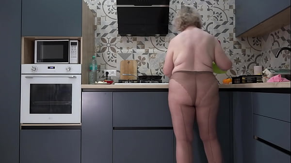 Image What do you want for breakfast: me or scrambled eggs? Curvy wife in nylon pantyhose in the kitchen. Busty milf with big ass behind the scenes.