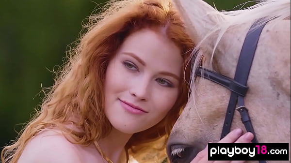Image Redhead Latvian diva Heidi Romanova reveals her big natural boobs outdoor