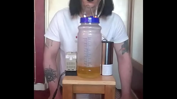 Image bisexual crossdresser with his portable cow milking machine part 1