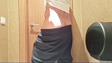 Image Muscular man - Risky masturbation in a public bathroom - Beautiful cum