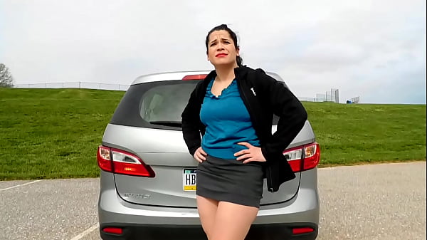 Image Daring exhibitionist shows asshole and pussy in tiny miniskirt