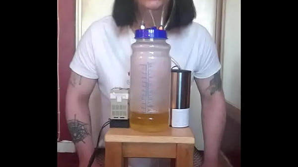 Image bisexual crossdresser with his portable cow milking machine part 3