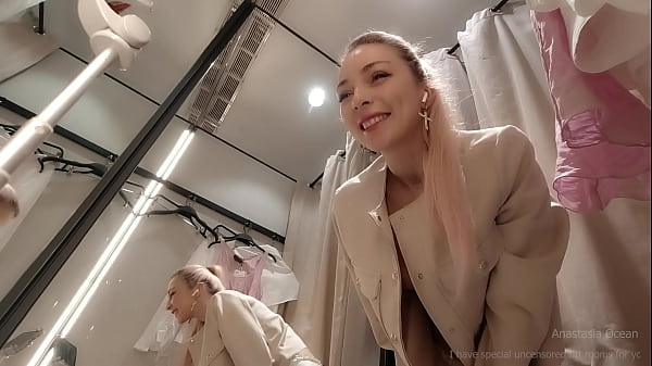 Image Online date in fitting room with open curtain. Public video call.