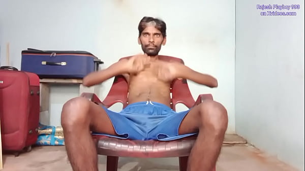 Image Rajesh Playboy 993 masturbating big cock and cumming. Sat in chair naked legs up fingering in asshole rubbing balls