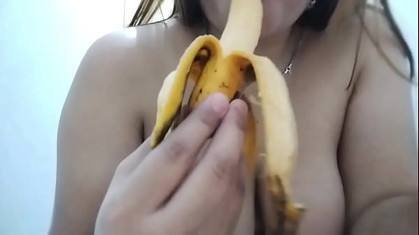 Image Busty Filipina's Banana Boob Play: Sensual Masked Delight