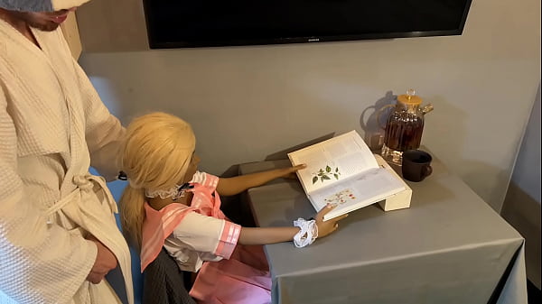 Image Horny Man Distracts Silicone SEX Doll from a Book