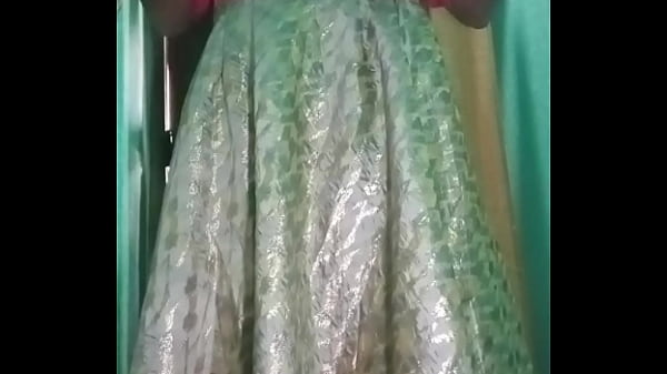 Image Indian Gay Crossdresser pressing her big boobs and fingering in her ass in pink dress