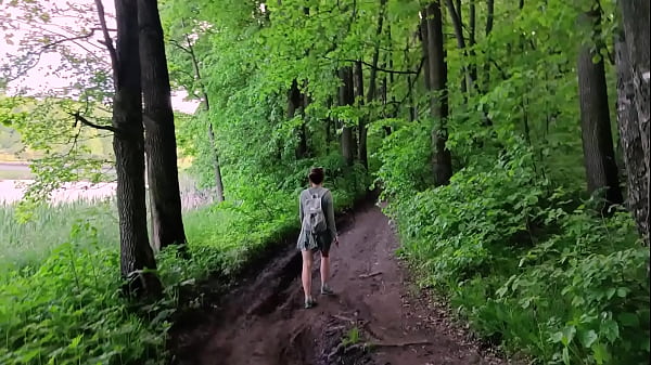 Image A lot of mosquitoes didn't stop her from sucking his cock in the woods