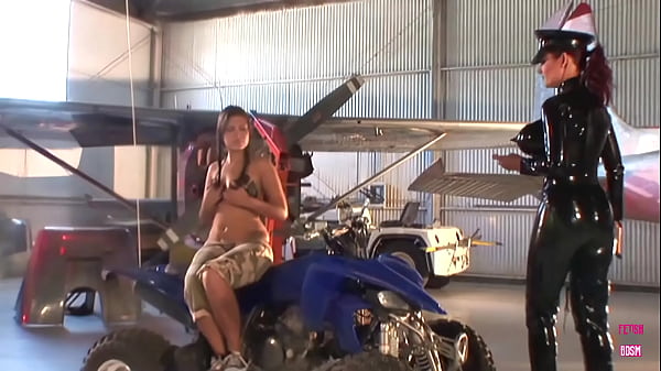 Image These two amazing lesbian friends had fun with their strap on in a warehouse