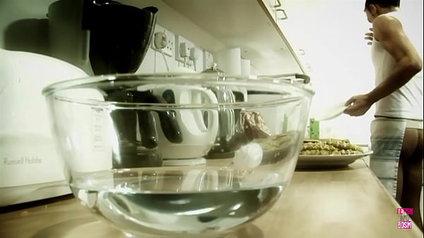 Image A blonde bimbo plays with cream and her mans dick in the kitchen until cumshot