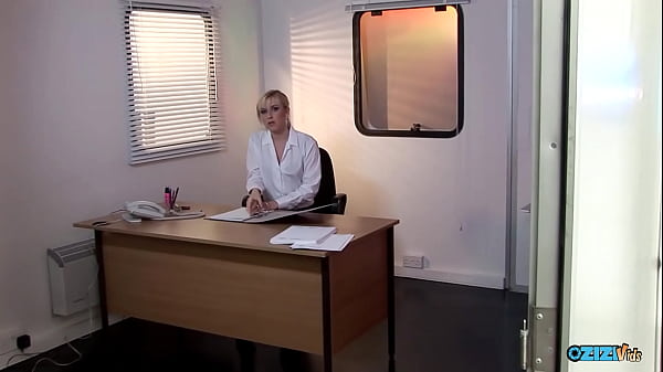Image There is something about this beautiful blonde secretary in black stockings that will make every man lose his mind.