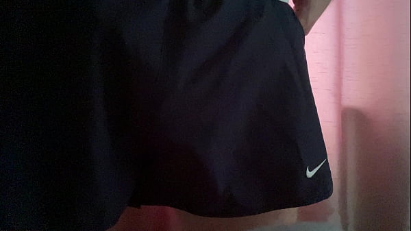 Image Mr Big Dick UK pulling out the big cock from his running shorts