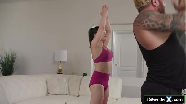 Image Sexy busty asian shemale Ember Fiera handjobs her instructor