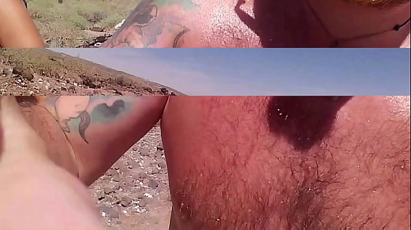Image Couple is hiking naked near the coast