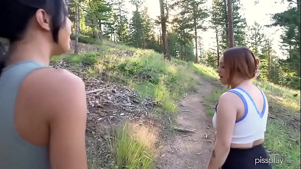 Image Lesbians - chubby ginger and hot brunette drink piss in the woods