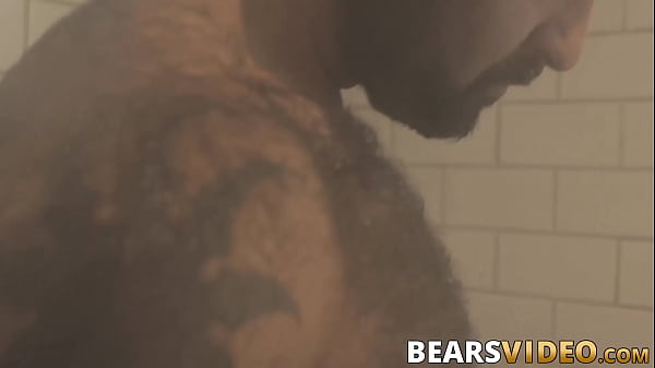 Image Atlas Grant shows off that bear body and tugs on his dick