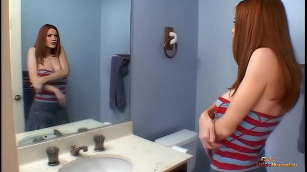 Image Gorgeous redhead is letting two guys fill her every hole and enjoys every moment.