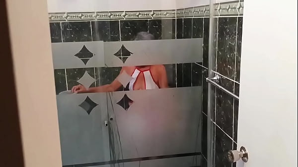 Image I watch my stepmom masturbate while cleaning the shower.