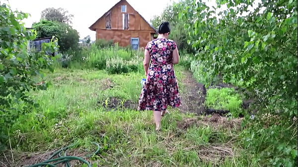 Image Mature housewife masturbates with a cucumber in the garden outdoors. She leaves the vegetable inside her pussy and goes home. Amateur fetish. PAWG.