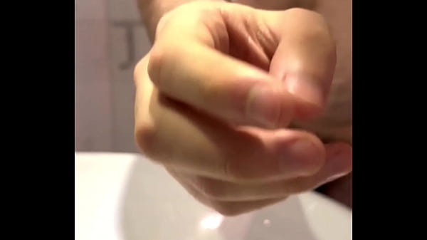 Image Masturbating while pouring cold water