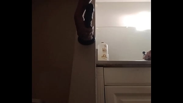 Image Sexy femboy playing in the bathroom with her toy