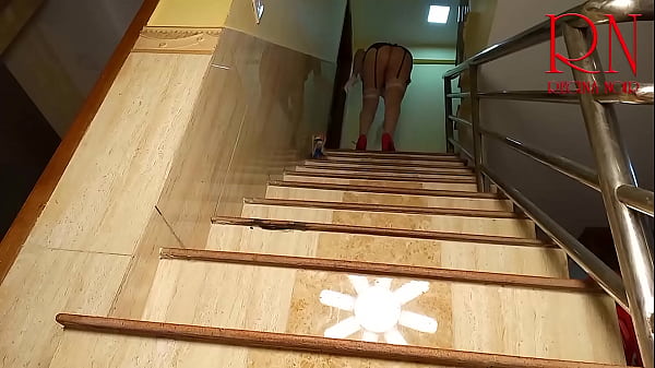 Image Depraved maid cleans the stairs of a large house. Regina Noir pussy show.