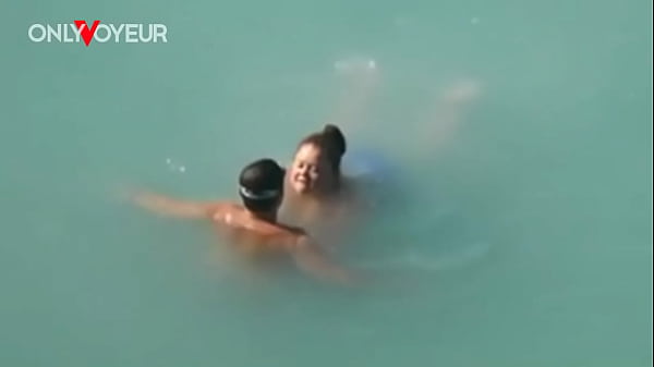 Image Beach Voyeur. Lucky guy caught BBW size mermaid in the sea