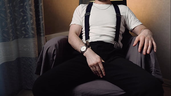 Image Handsome man Noel Dero caresses himself and jerks off his penis after work. 4K VIDEO