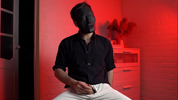 Image Masked handsome man Noel Dero watches kinky porn and jerks off. Loud moans and orgasm of a young guy
