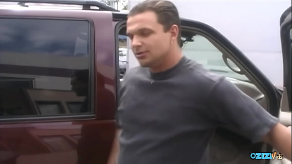 Image A thin brunette with big tits rides cock and gets titty fucked in the back of a Chevy.