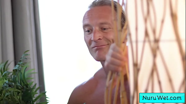 Image Sexy brunette masseuse rub her natural big tits on her clients and give them a wet nuru amssage - Mona Azar, Lee Bone, Clarke Kent