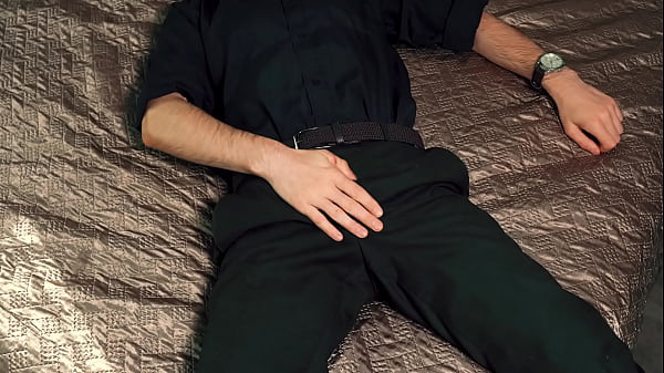 Image Young handsome man Noel Dero masturbates on the bed in a beautiful suit and brings himself to orgasm