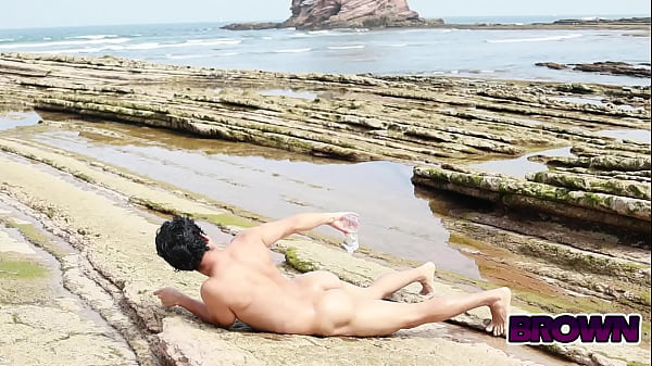 Image Oil rain on nudist beach