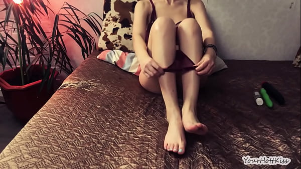 Image A young student in glasses and sexy lingerie caresses herself with a vibrator in the video and cums loudly.