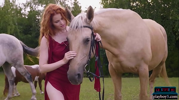 Image Gorgeous hot redhead MILF Heidi Romanova outdoor solo for Playboy