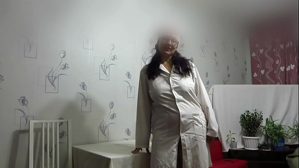 Image The doctor does vaginal fisting and masturbates his nurse's pussy. Amateur medical fetish with a mature couple.