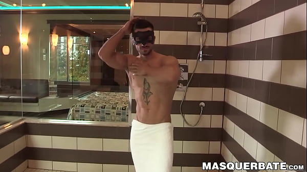Image Masked ripped guy shows of enormous cock during shower