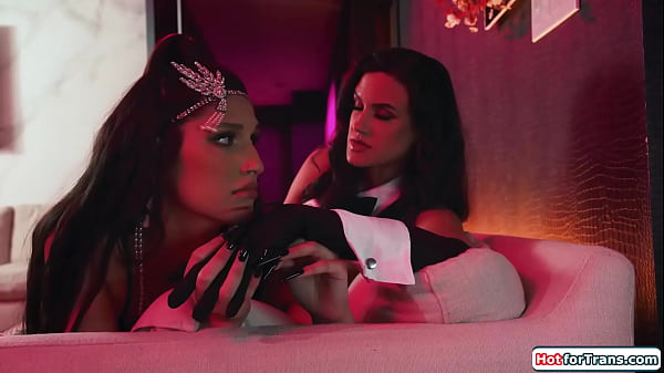 Image Busty magician makes shemales dick hard