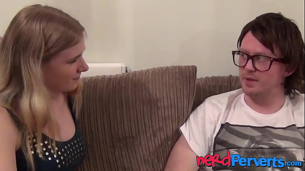 Image Busty UK hottie sensually sucking nerds swollen cock
