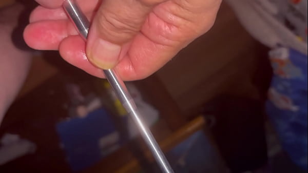 Image Using  sounding rod while masturbating
