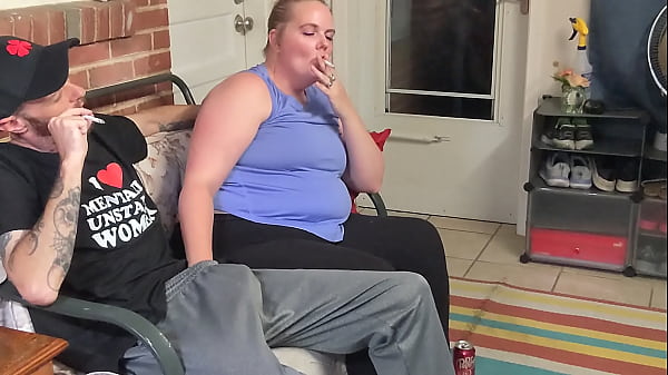 Image Cheating wife caught giving the neighbor a blowjob and smoking!
