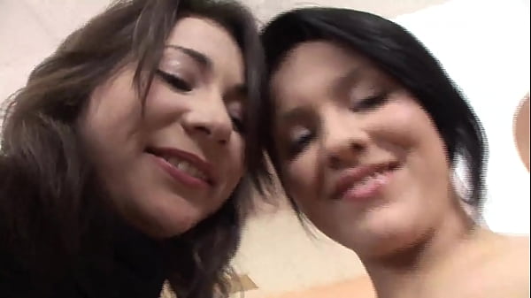 Image A very hot threesome! Two black haired sluts are pleasuring themselves when a lucky guy walks in...