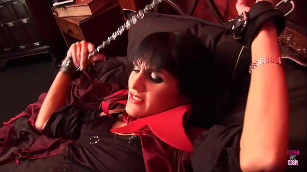 Image A horny guy fucks a hot brunette slave tied up on his bed