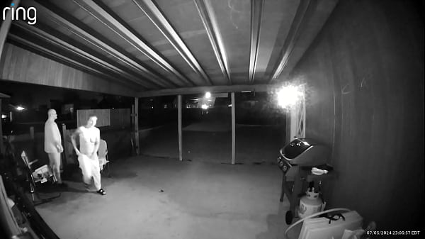 Image bent over on back porch