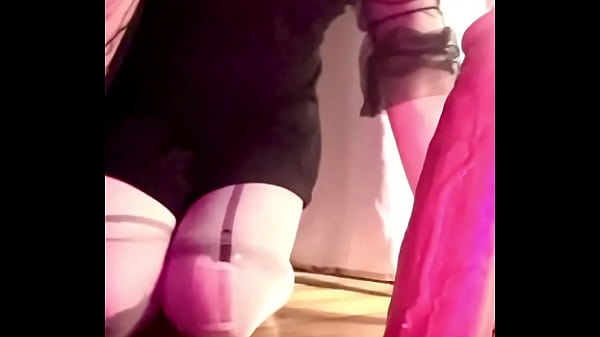 Image A cute femboy swallows a huge dildo in his mouth and passionately pushes his hole on it