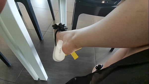 Image Flip flops in crowded public place