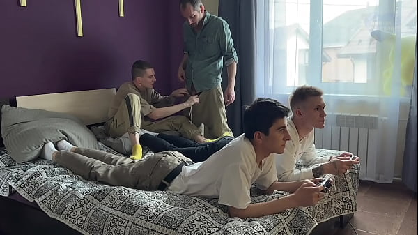 Image Stepfather and stepson fuck twinks in their tight asses while they play the console