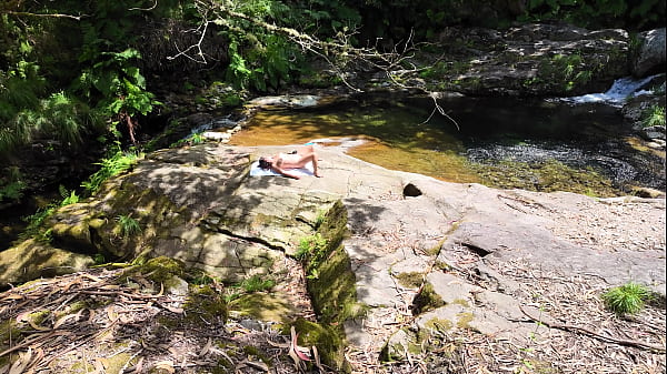 Image An impudent Voyeur Fingered a Naked Milf on a Nudist Beach in the Forest