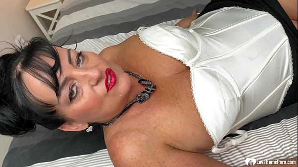 Image MILF next door teases with her big tits